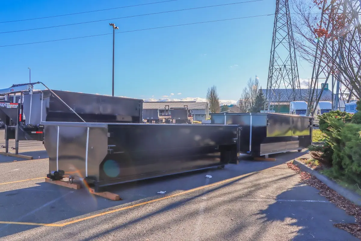 Roll-off dumpster ready for waste disposal at job site for Demolition Dumpster Rental in Dryden